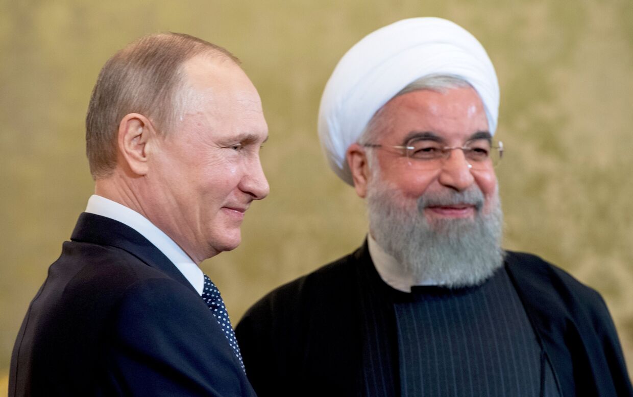 Президент РФ Владимир Путин и президент Исламской Республики Иран Хасан Роухани