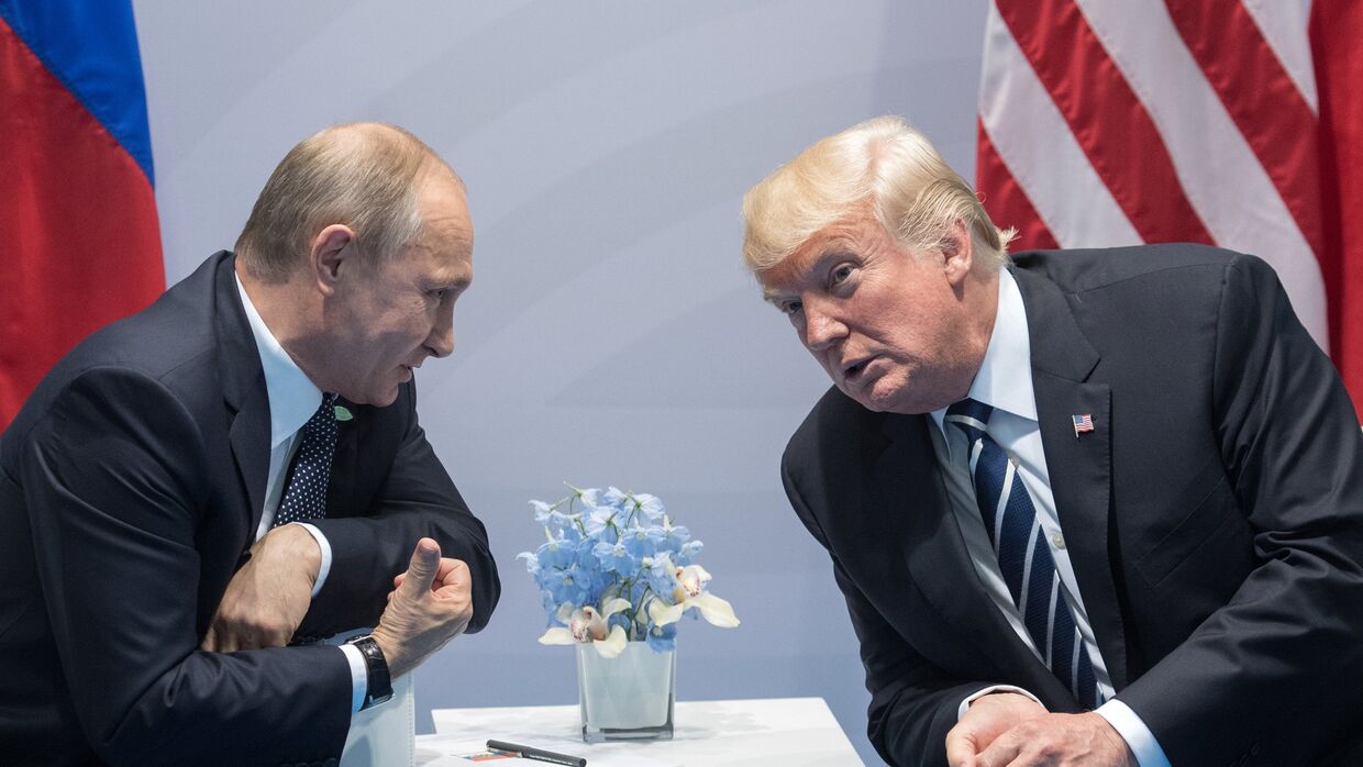 Президент РФ Владимир Путин и президент США Дональд Трамп на саммите G20