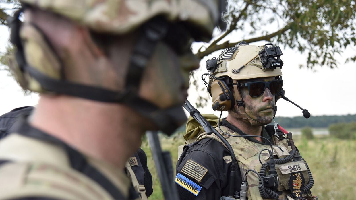 Военнослужащие вооруженных сил Украины и армейских подразделений иностранных государств во время активной фазы военных учений Репид Трайдент - 2018